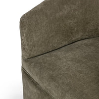Close-up of the Olive Moss chair's rounded seat and inner-back seam
