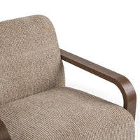 Close-up of the Almond Husk chair's woven seat and back beside a curved ash arm