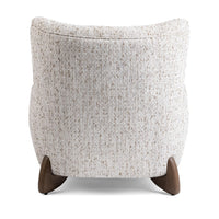 Back view of the Canvas Oat wingback chair with curved upholstery and ash feet