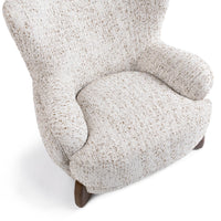 Overhead detail of the Canvas Oat chair's broad seat and rounded arms