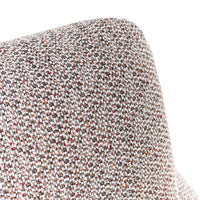 Close-up of the armless chair's woven fabric with red and pale threads