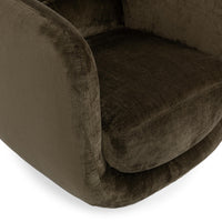Close-up of the Olive Green chair's rounded seat and curved upholstered arm