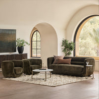Olive Green swivel chairs styled with a sofa in a room with arched windows