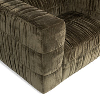 Close-up of the Olive Green chair's wide padded arm and gathered seat upholstery