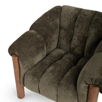 Angled close-up of the Olive Green chair's channel-tufted back and seat