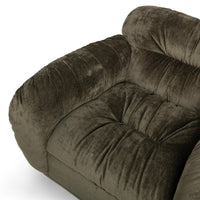 Close-up of the Olive Green chair's gathered seat, arm and padded back