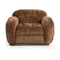 Front view of the Bronze accent chair with gathered upholstery and rounded arms