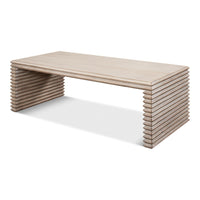 Long stacked-plank cocktail table in stone gray wire-brushed wood with ribbed end supports