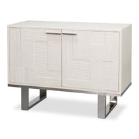 Small embossed white credenza with textured ivory doors and polished metal sled base