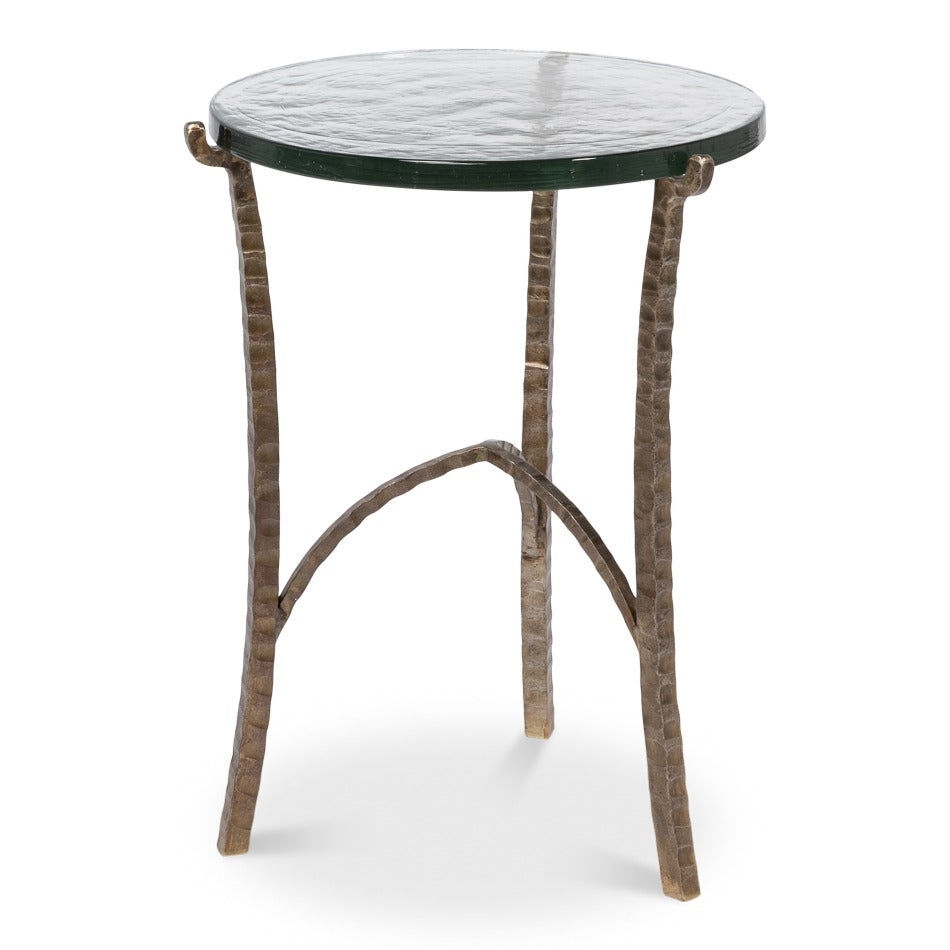 Aged bronze round side table with cast glass top and forged iron tripod base