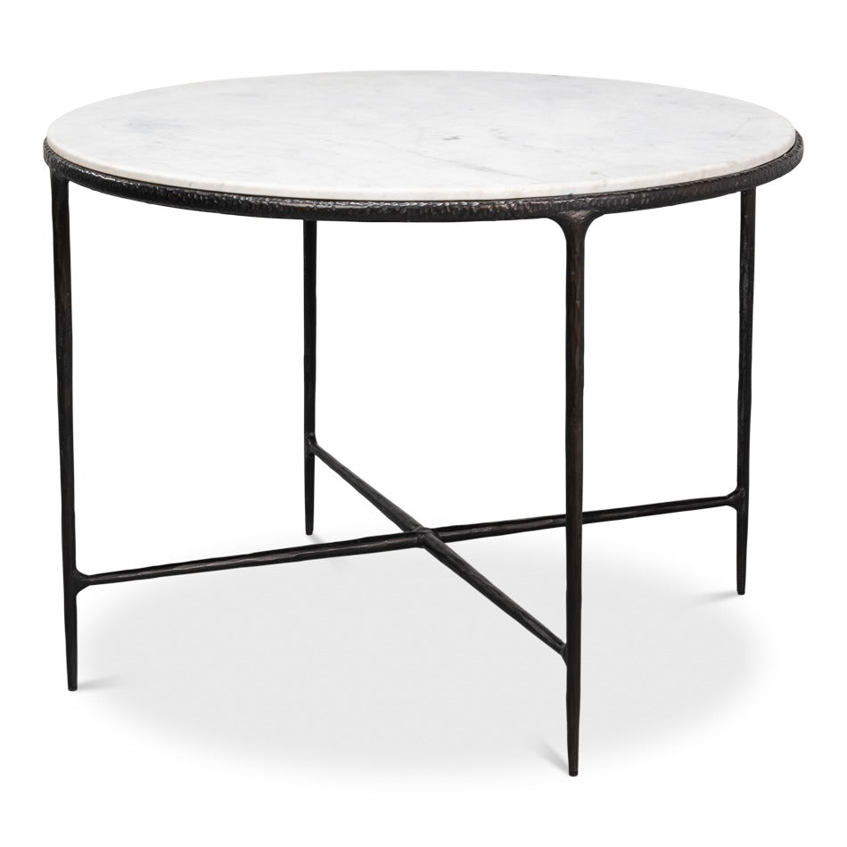 Round breakfast table with distressed white marble top and forged iron base
