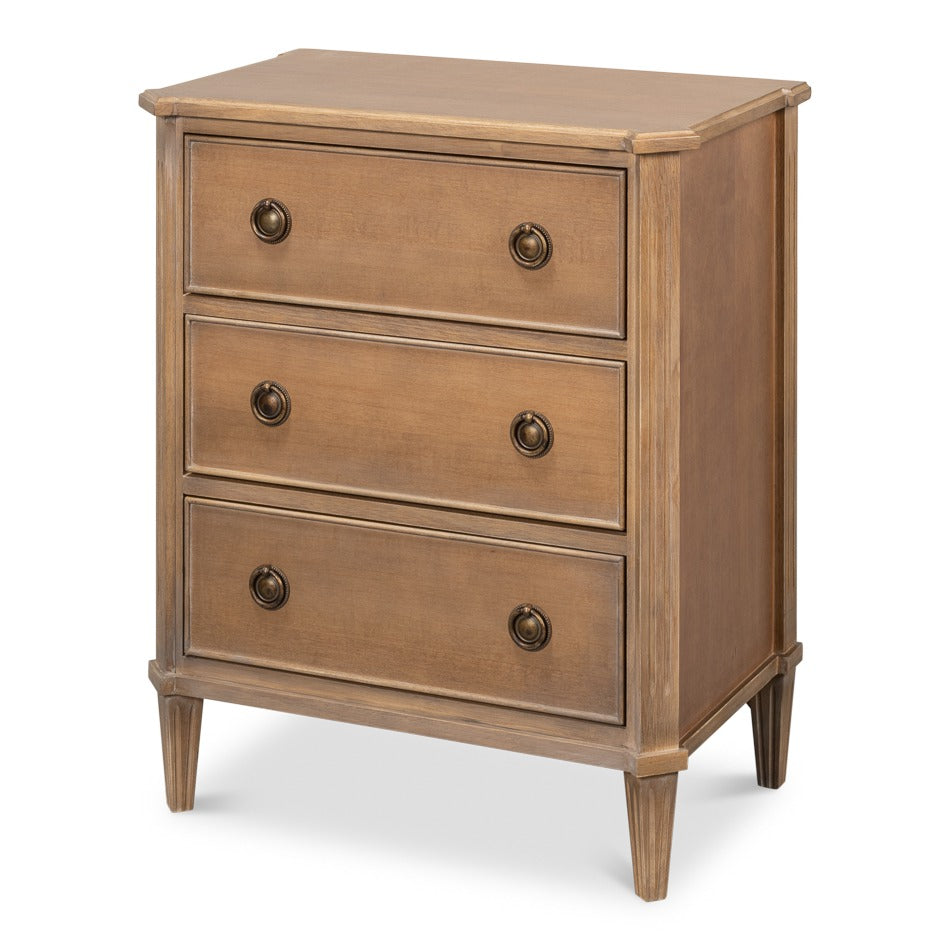 Neoclassical three-drawer chest in brown tulipwood with ring pulls and tapered legs