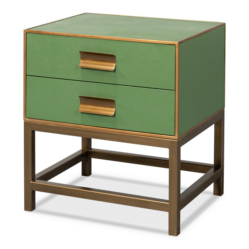 pale green shagreen side table with two drawers, brass trim, and an open metal base