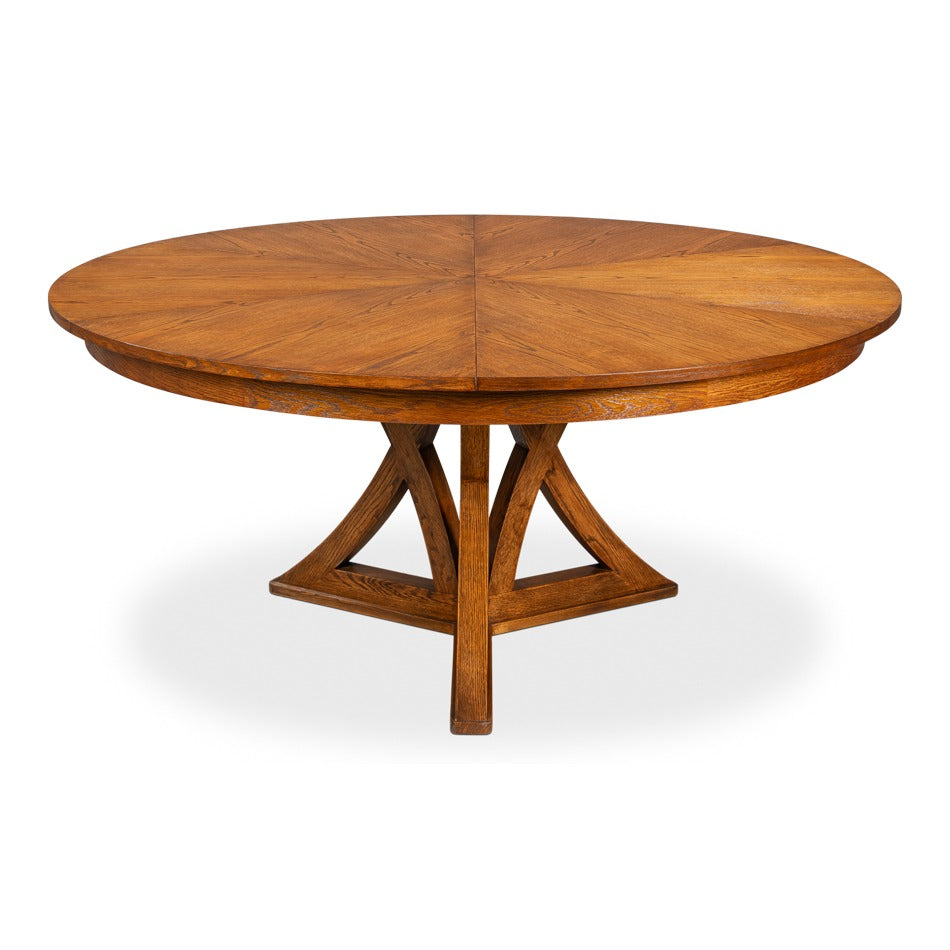 Transitional Round Jupe Dining Table, Medium – Light Brown Oak with Splayed Pedestal Base – styled view
