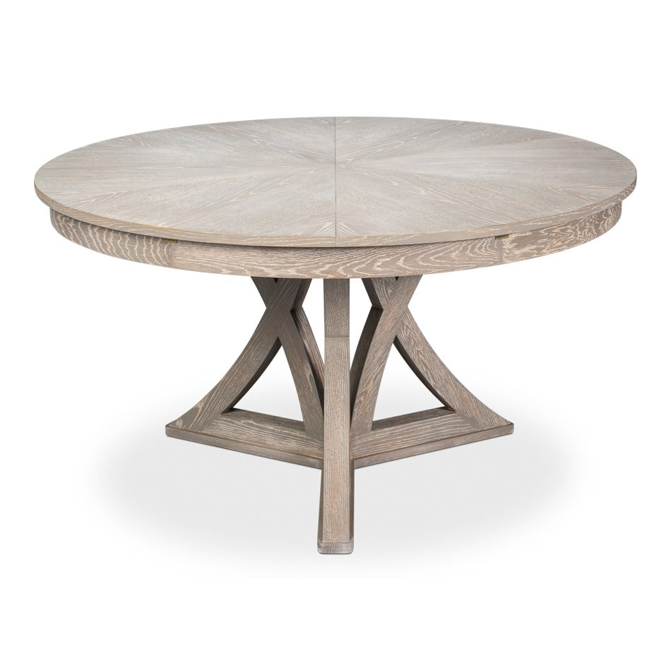 Transitional Round Jupe Dining Table, Large – Grey Oak with Sculptural X-Form Pedestal – styled view