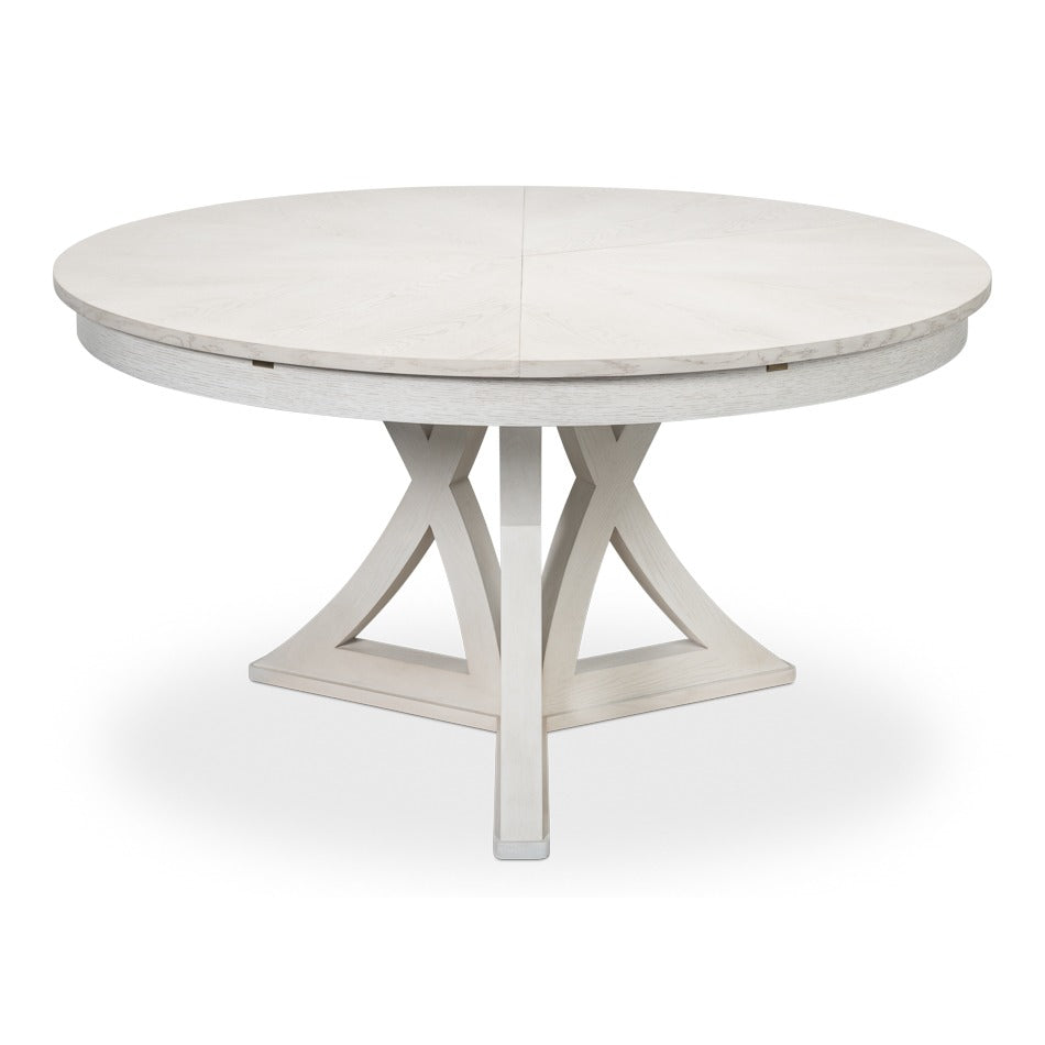 Transitional Round Jupe Dining Table, Large – White Oak with Sculptural X-Form Pedestal – styled view