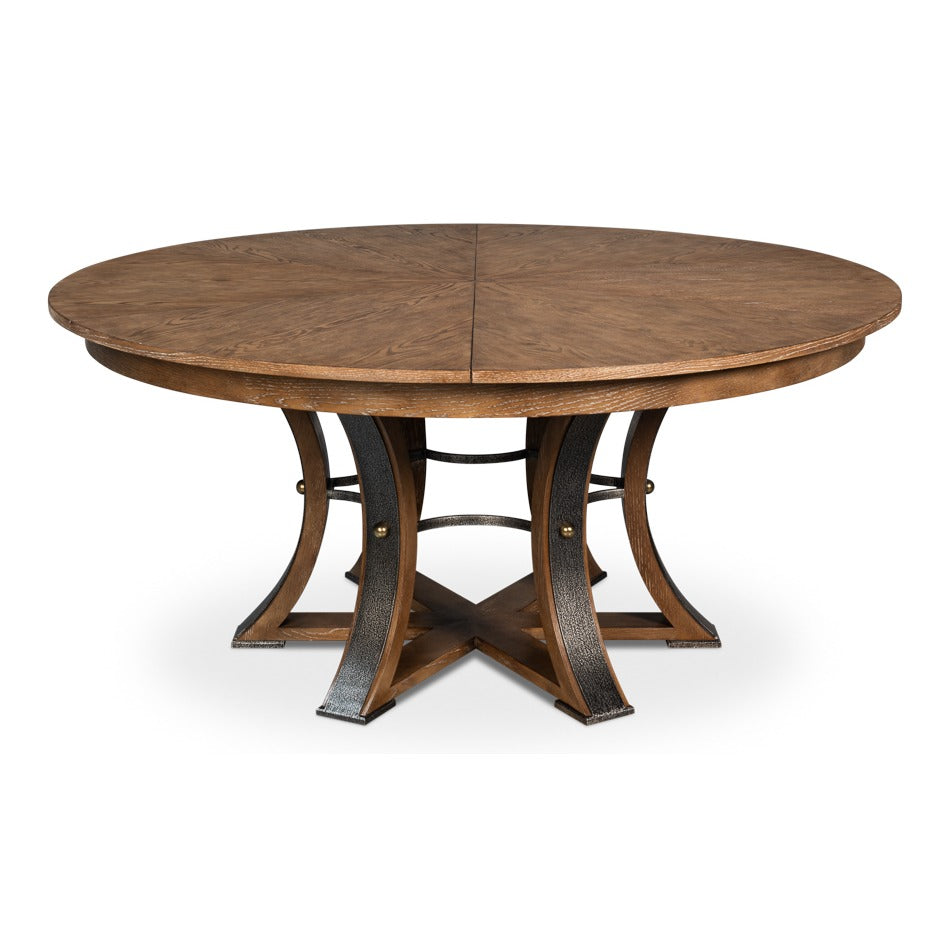 Transitional Round Jupe Dining Table, Large – Light Brown Oak with Hammered Iron Base – styled view