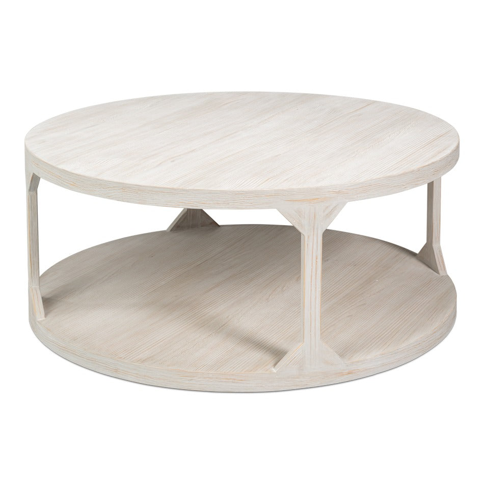 Round drum coffee table in hand-rubbed gray pine with lower platform shelf