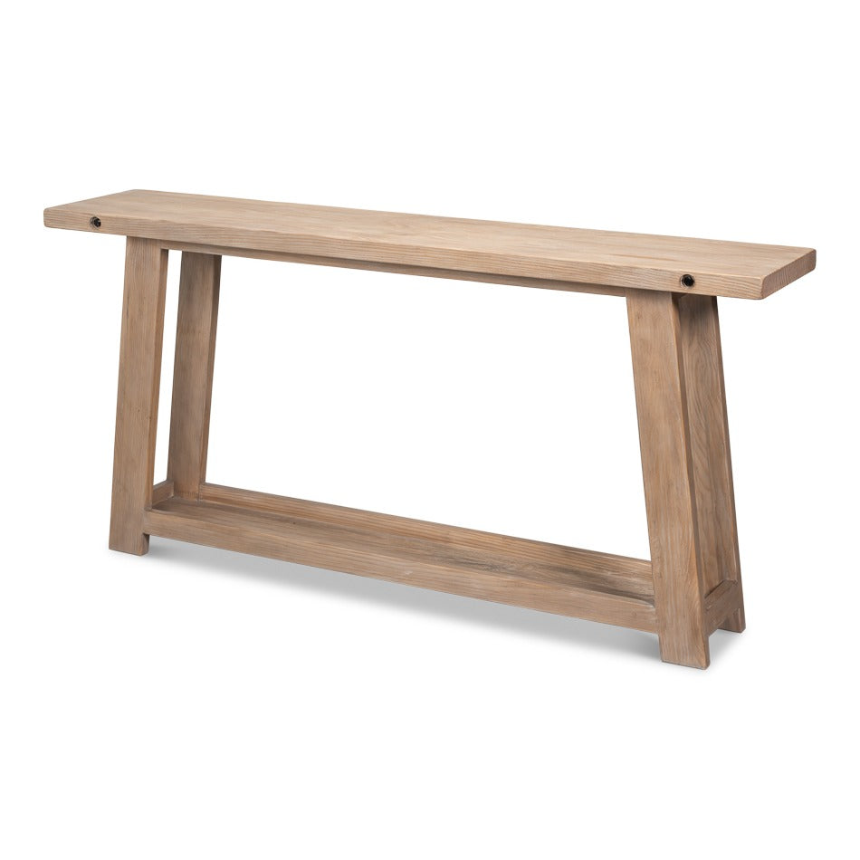 Long farmhouse console table in naturally aged pine with tapered legs and open lower shelf
