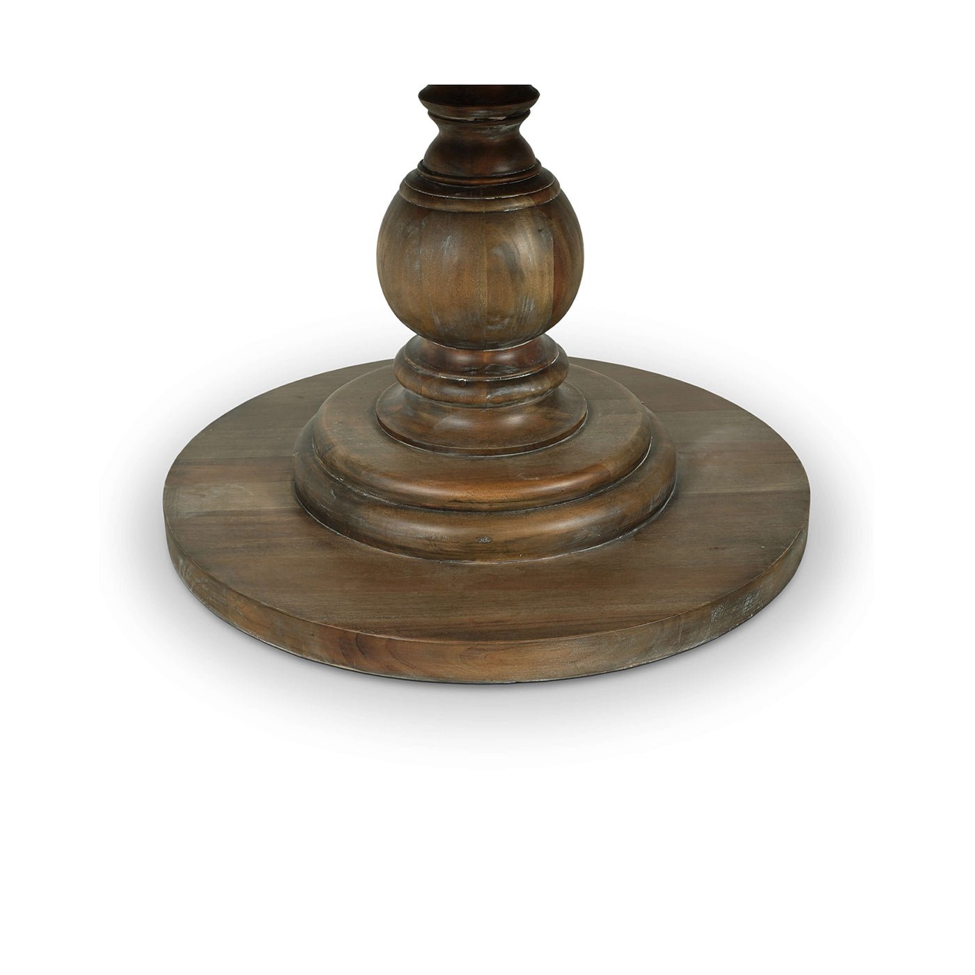 Close-up of wooden pedestal base, round table.
