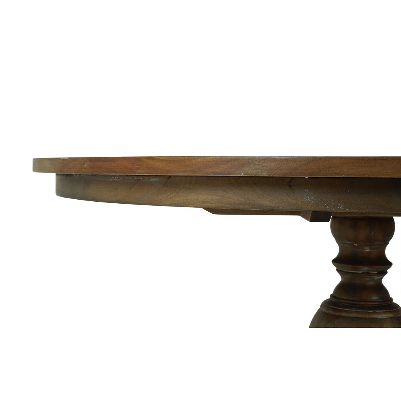 Close-up of round table edge and pedestal column.