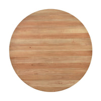 Top view of round fruitwood dining table.