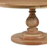 Close-up of table pedestal, fruitwood dining table.