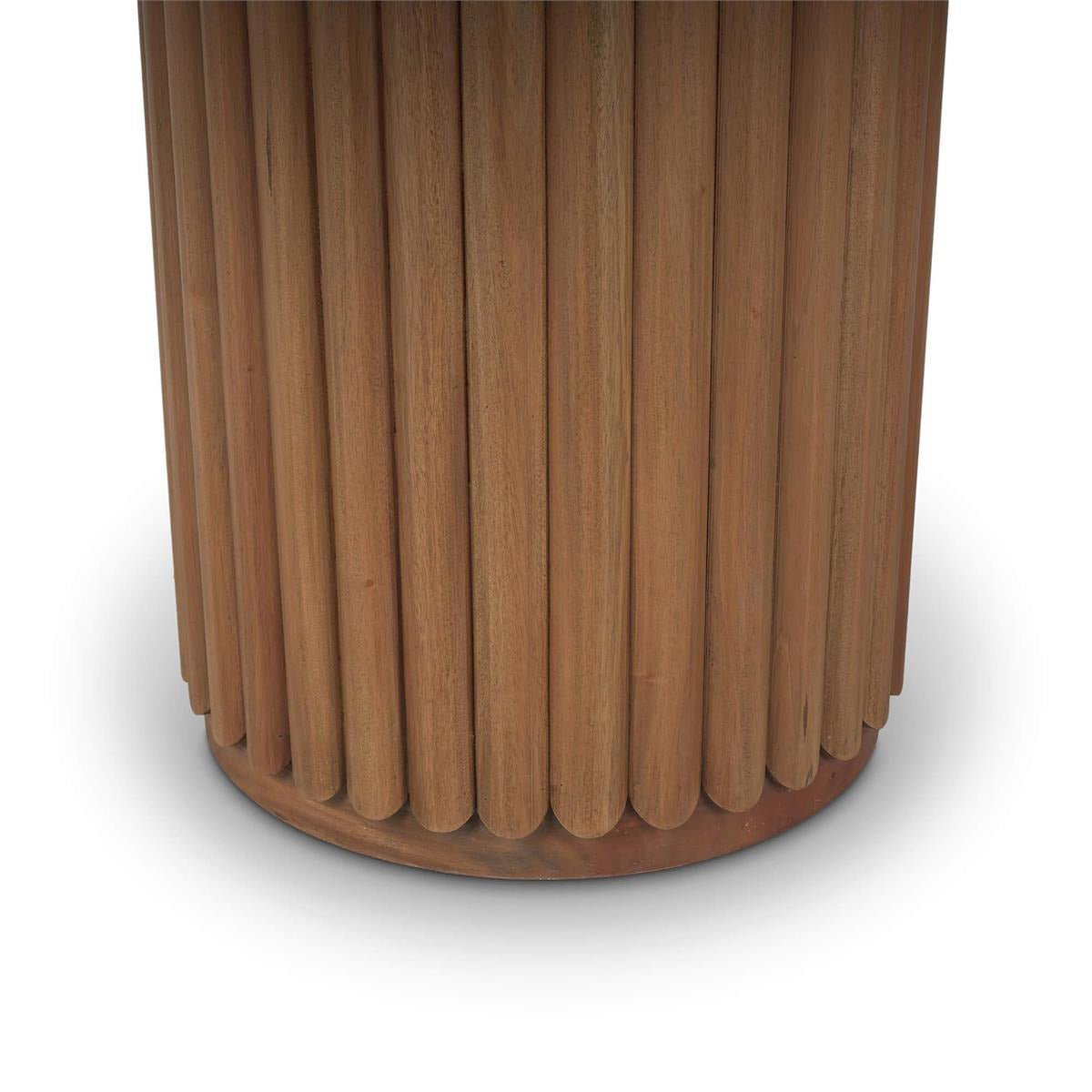 Pedestal base of ribbed dining table close-up.