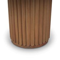 Pedestal base of ribbed dining table close-up.