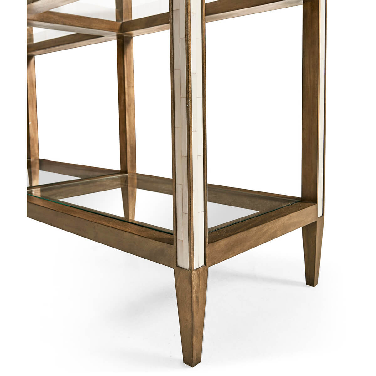Base of etagere with tapered wooden legs and glass shelf.