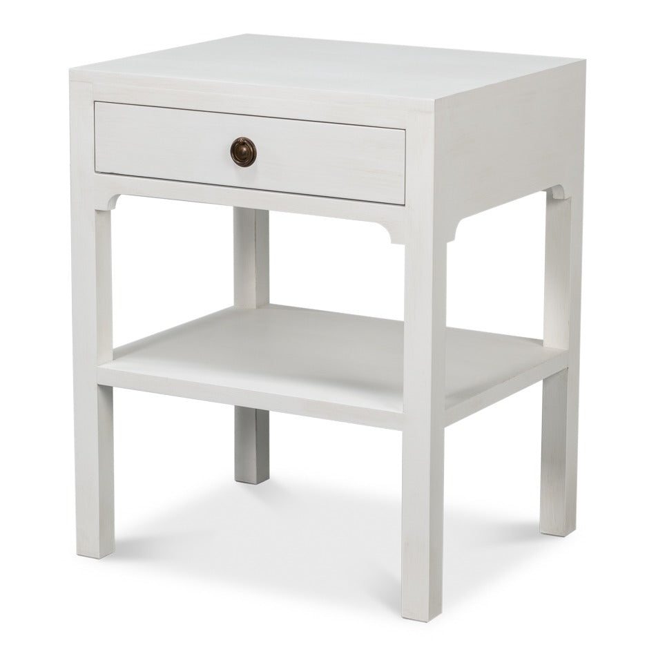 transitional single-drawer side table in soft white finish with open lower shelf and dark round knob