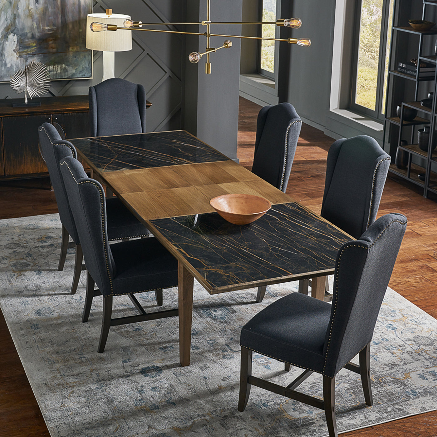 Neo Classic dining table with six chairs in a room.