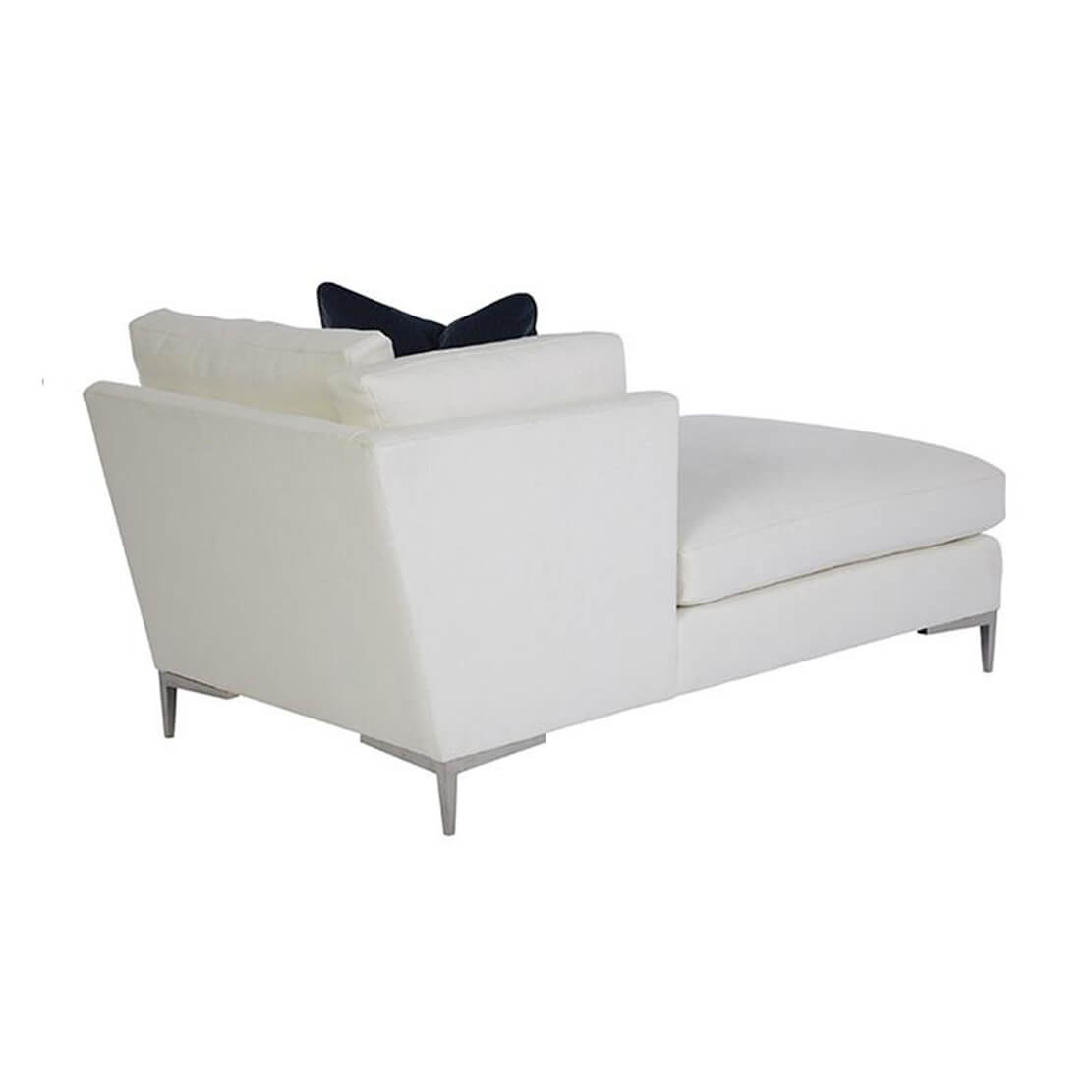 Rear angle of white chaise with minimal design.