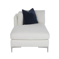 Front view of white chaise and dark accent pillow.