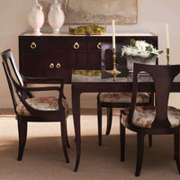 Dining chairs in elegant dining room setting.