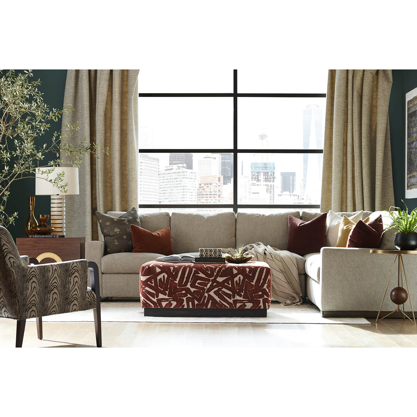 Neutral sectional sofa in styled living room.