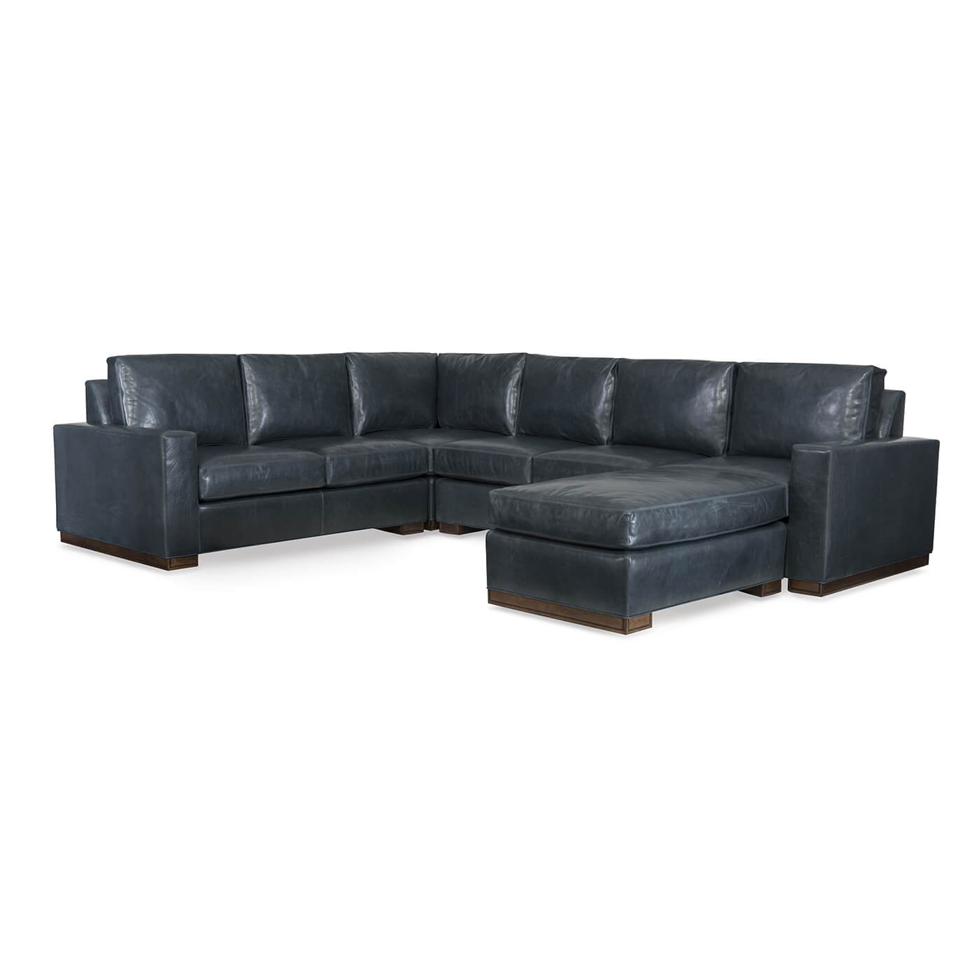 Blue corner sectional sofa with matching ottoman.