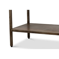Console table bottom shelf, showing sturdy metal legs.