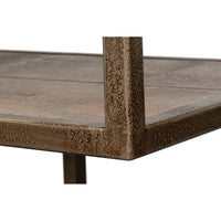 Close-up of textured metal frame on console table.