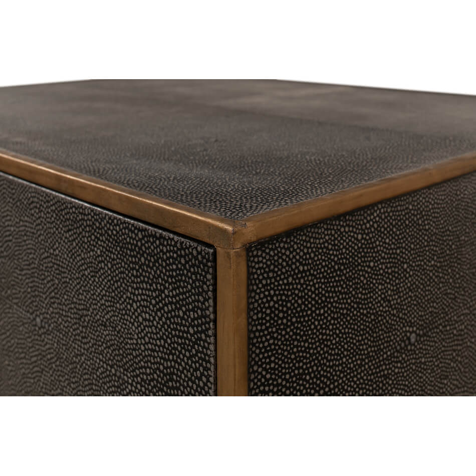 Corner detail of antique gray modern end table.