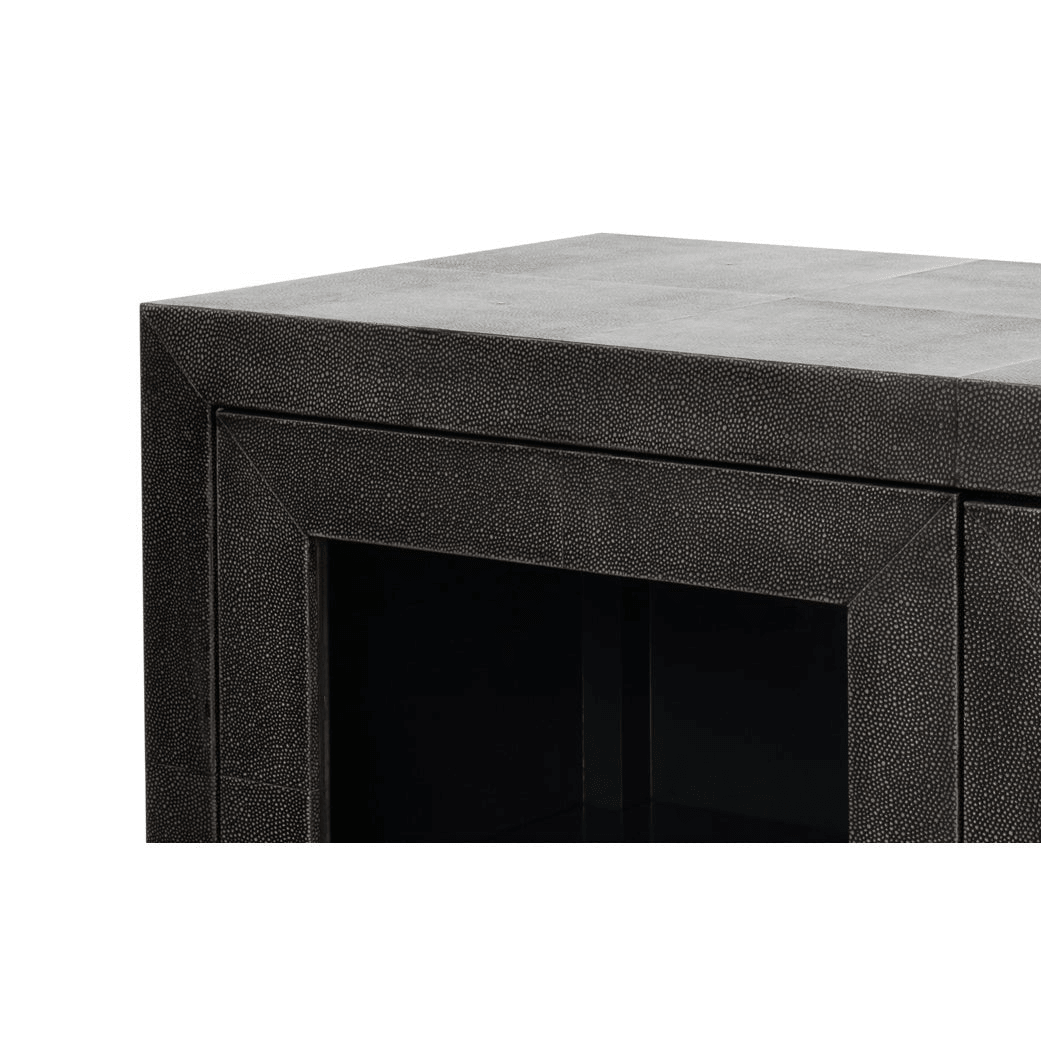 Corner detail of black leather sideboard construction.