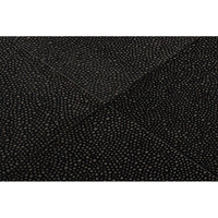 Close-up of textured black leather surface detail.