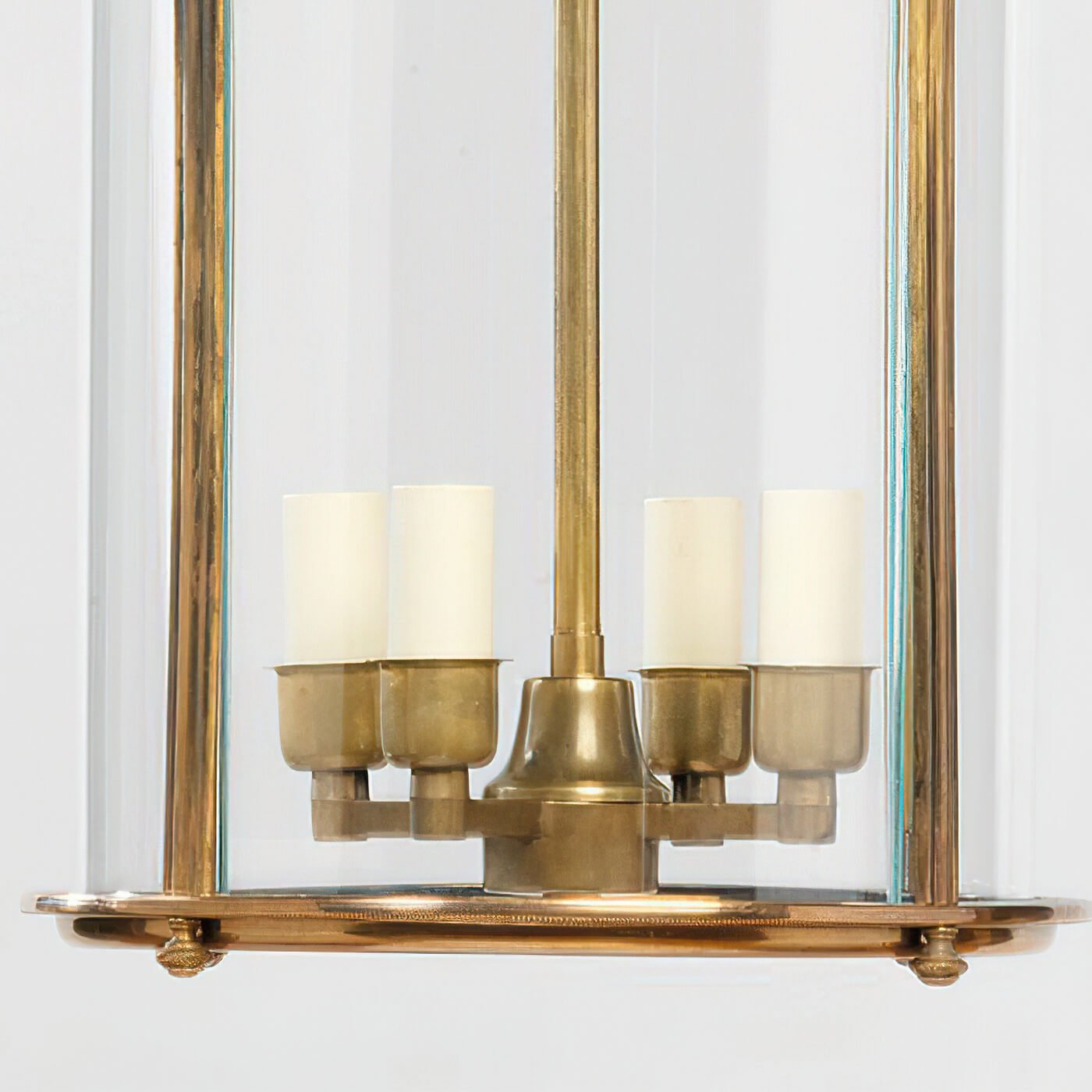 Close-up base of antique lantern, bulb holders detailed.