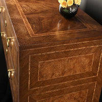 Close-up of wood detailing on antique style chest top.
