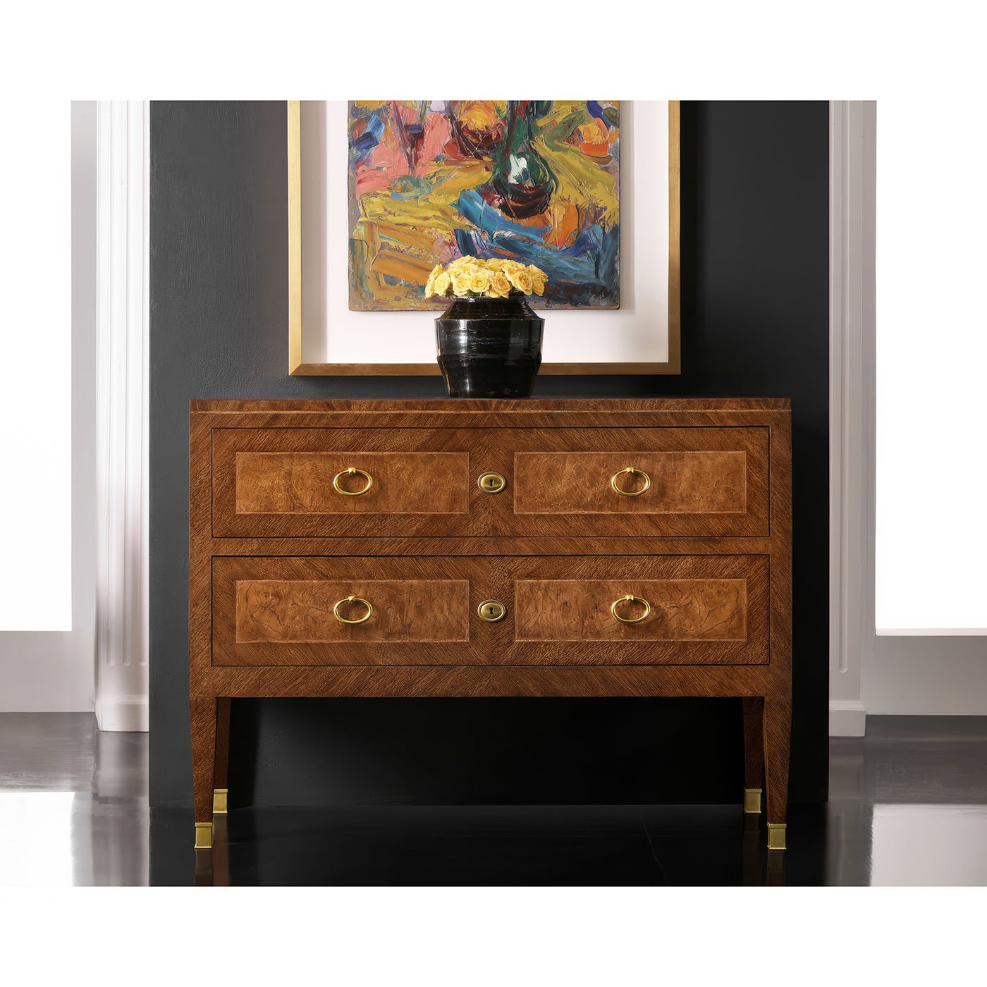 Antique style chest of drawers in stylish room setting.