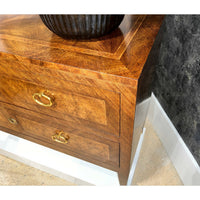 Top corner view showing wood grain of antique chest.