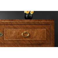 Drawer handle detail on antique style chest of drawers.