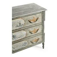Close-up of drawer fronts, antique-style commode with painting.