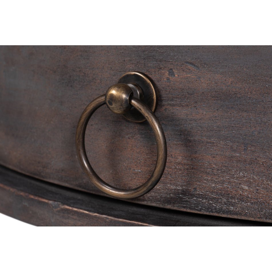 Drawer pull ring detail on side table.