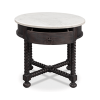 Open drawer on round side table.